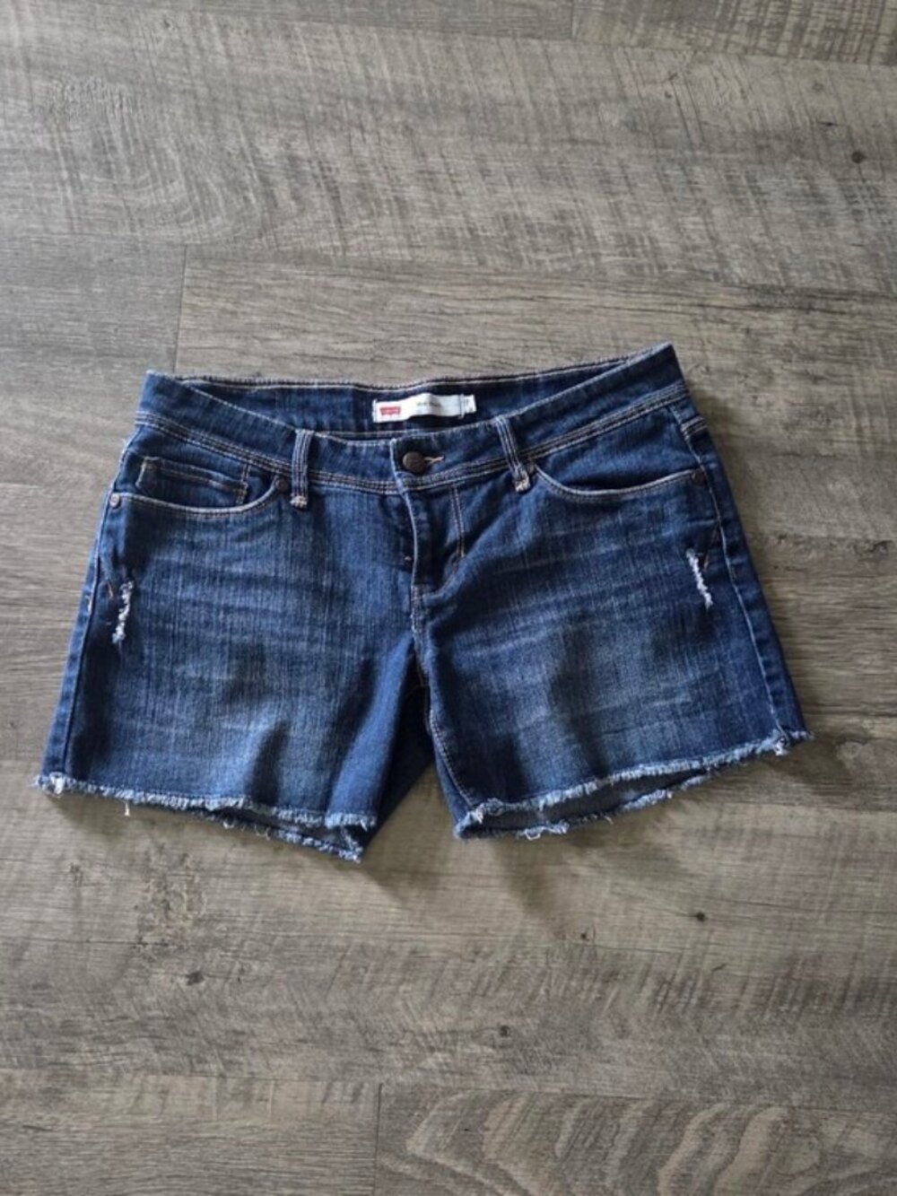 Levi's Dark Blue Cutoff Denim Shorts.